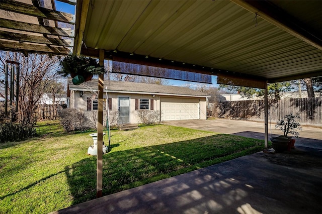 view of patio / terrace with a garage