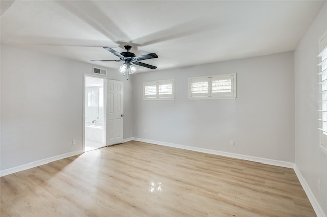 empty room with light hardwood / wood-style floors and ceiling fan