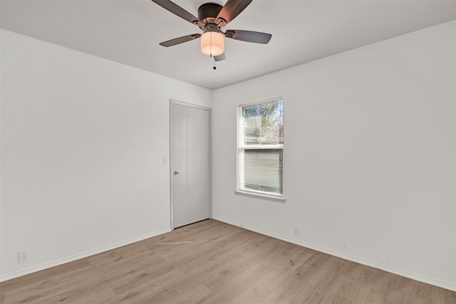 unfurnished room featuring ceiling fan and light hardwood / wood-style flooring