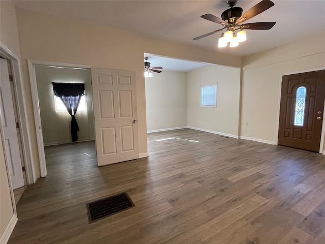 foyer featuring dark hardwood / wood-style floors and ceiling fan