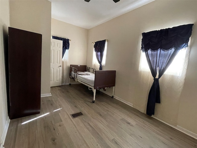 bedroom featuring wood-type flooring