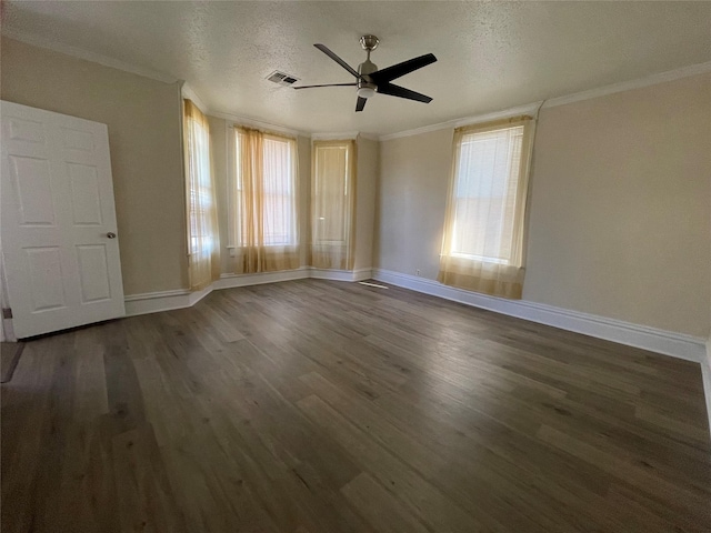 unfurnished room with ceiling fan, crown molding, dark hardwood / wood-style floors, and a textured ceiling