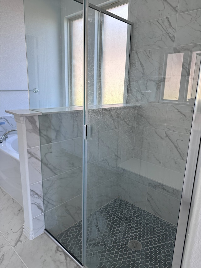 bathroom with independent shower and bath