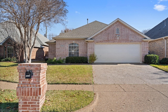 single story home featuring a front yard and a garage