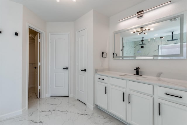 bathroom featuring vanity and a shower