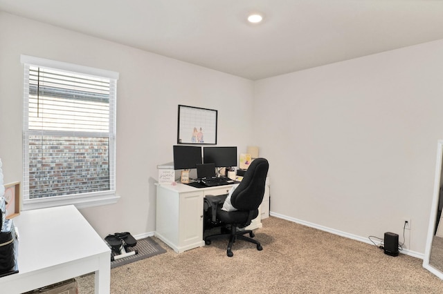 office space with light colored carpet