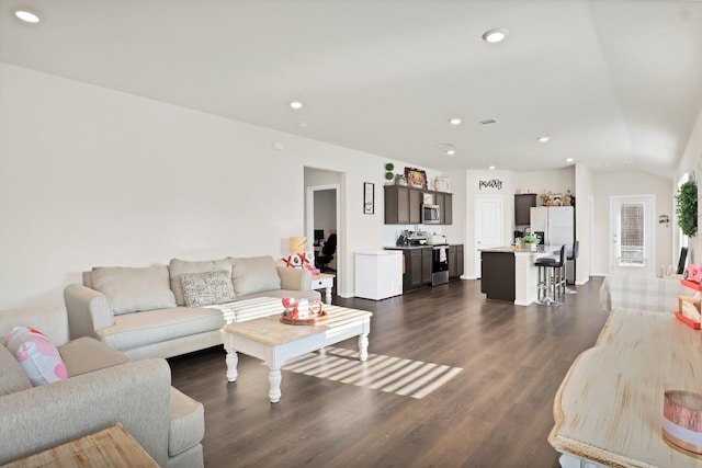 living room featuring dark wood-type flooring