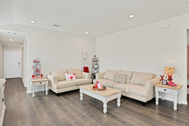 living room featuring dark hardwood / wood-style floors