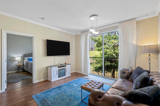 living room featuring crown molding and wood-type flooring