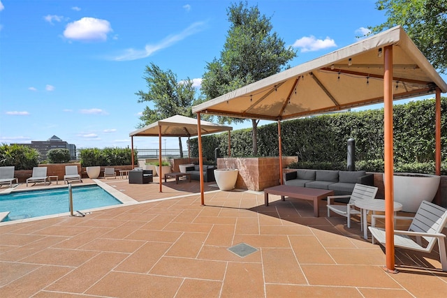 view of swimming pool with a patio and an outdoor hangout area