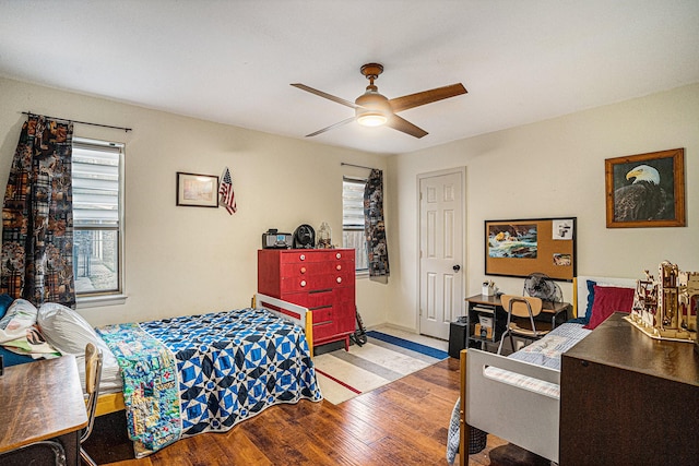 bedroom featuring light hardwood / wood-style flooring and ceiling fan