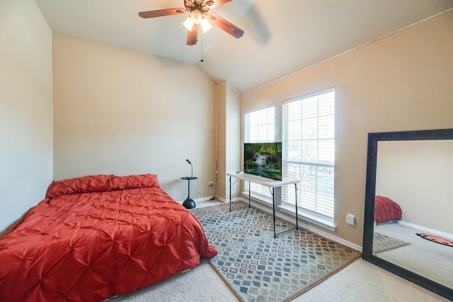 bedroom featuring carpet flooring, ceiling fan, and lofted ceiling