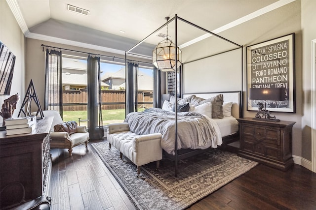 bedroom featuring dark hardwood / wood-style floors and crown molding