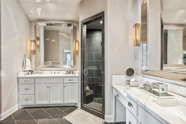 bathroom with tile patterned flooring, vanity, and a shower with shower door