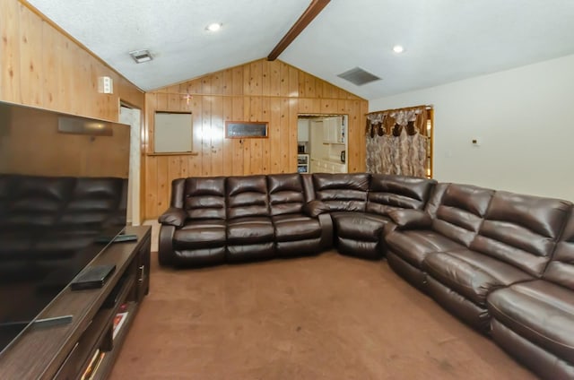 living room with carpet, lofted ceiling with beams, and wooden walls