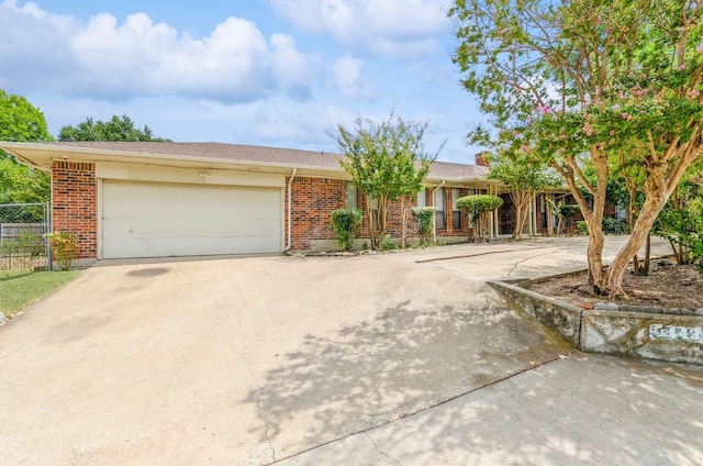 single story home featuring a garage