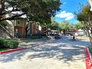 view of road with curbs