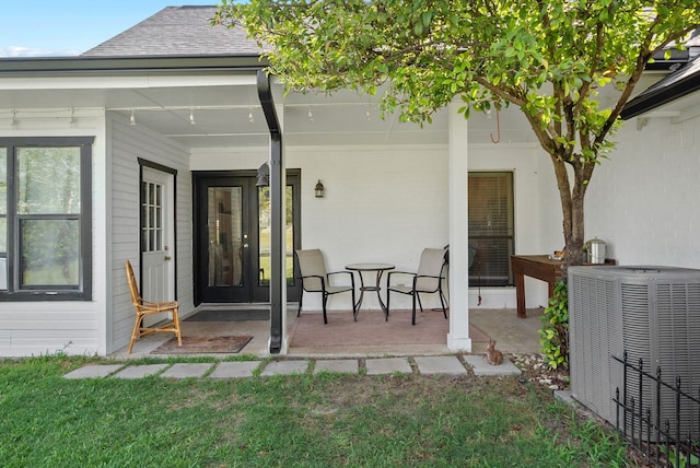 exterior space featuring central AC and a patio