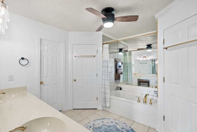bathroom with tile patterned flooring, vanity, plus walk in shower, and a textured ceiling