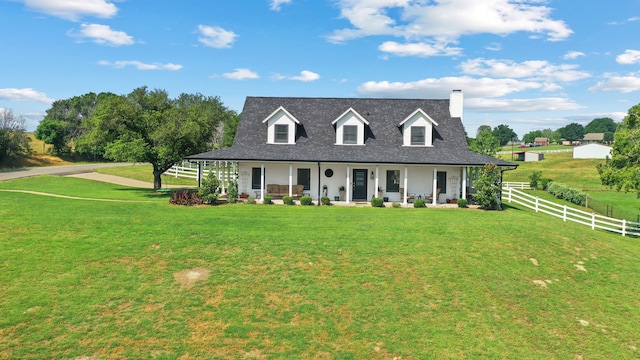 view of front of home featuring a porch and a front yard