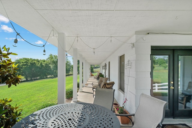 view of patio featuring a porch