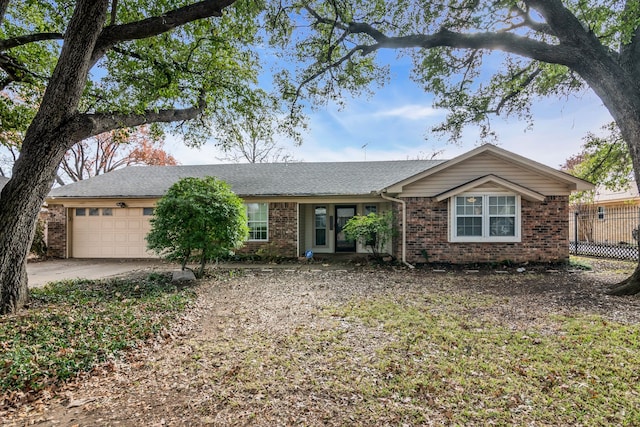 ranch-style home with a garage