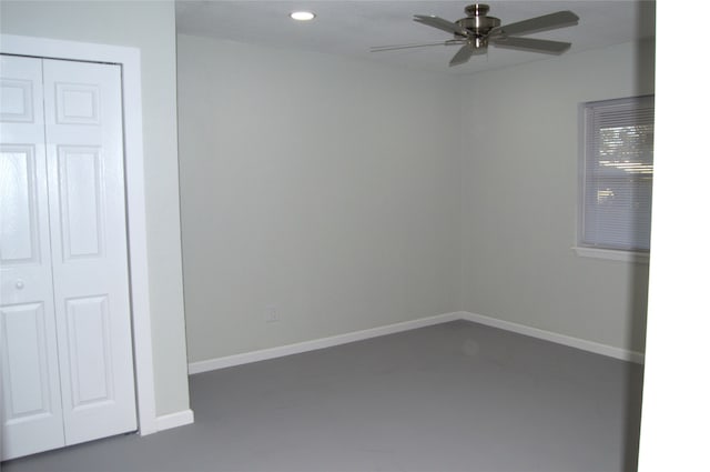 spare room with ceiling fan