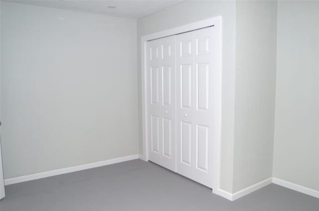 unfurnished bedroom featuring a closet