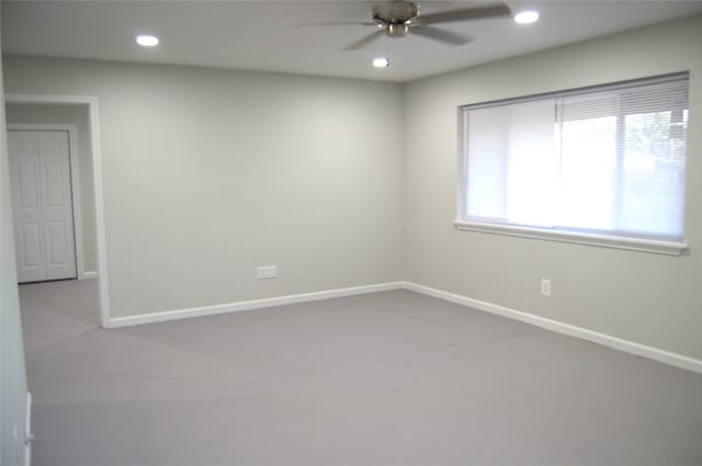 empty room featuring ceiling fan