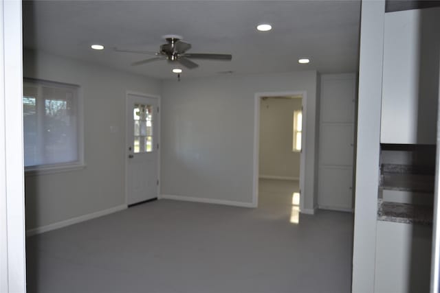 spare room with ceiling fan