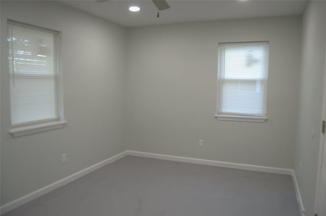 spare room featuring ceiling fan