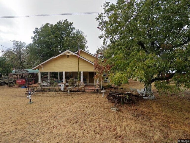 back of property featuring a patio