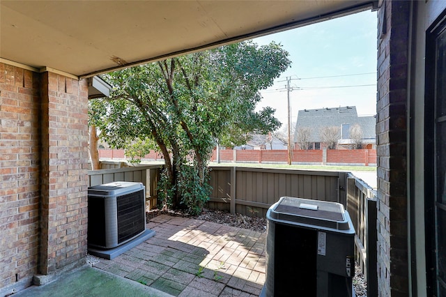 view of patio with central AC unit