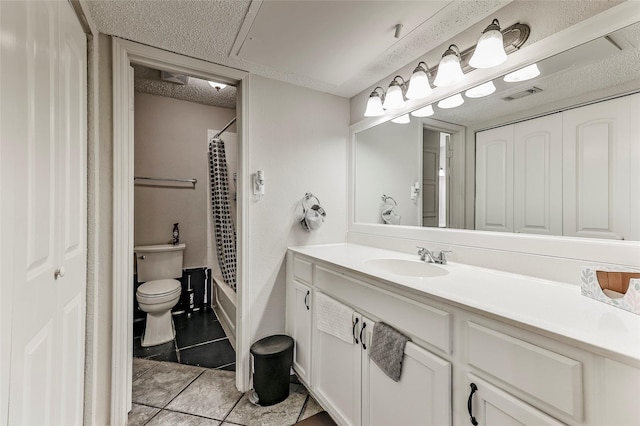 full bathroom featuring tile patterned flooring, vanity, toilet, and shower / tub combo with curtain