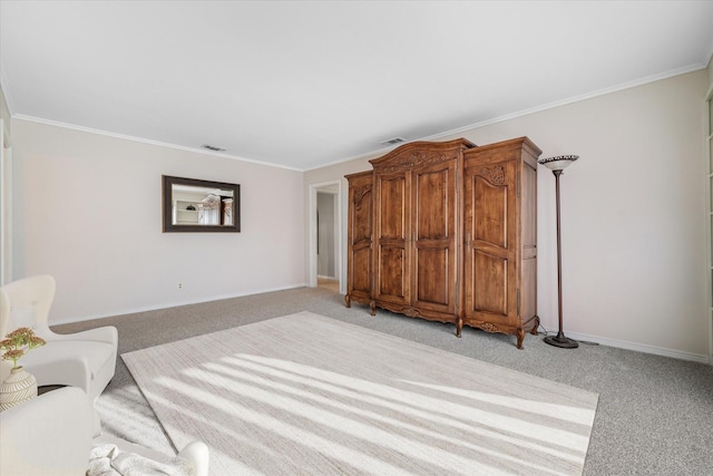 unfurnished room featuring ornamental molding, light carpet, and visible vents