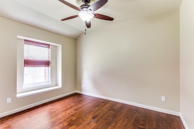 unfurnished room with ceiling fan, wood-type flooring, and vaulted ceiling