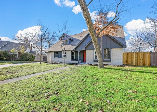 view of front of house with a front lawn