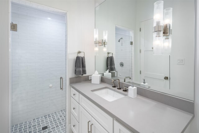 bathroom with vanity and walk in shower