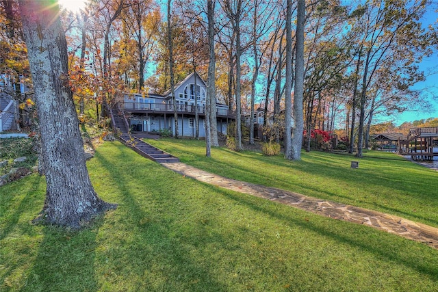 view of yard featuring a deck