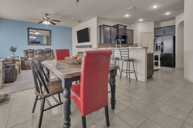 dining space with ceiling fan