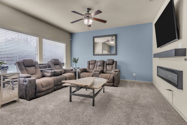 living room with carpet flooring and ceiling fan