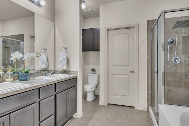 full bathroom with tile patterned floors, vanity, independent shower and bath, and toilet