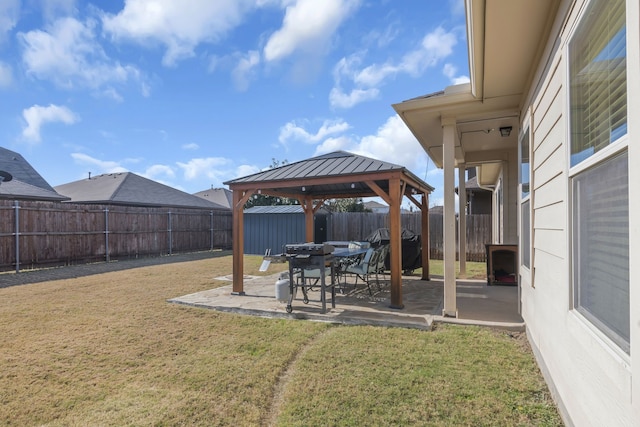 view of yard featuring a gazebo and a patio area