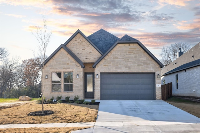 view of front of property featuring a garage