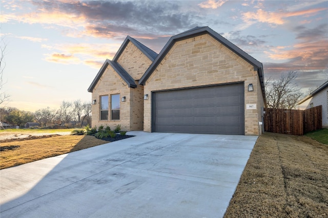 view of front of property featuring a garage