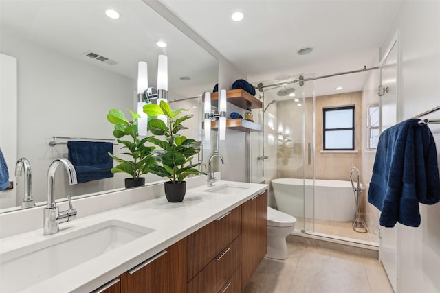 full bathroom with vanity, tile patterned floors, toilet, and separate shower and tub