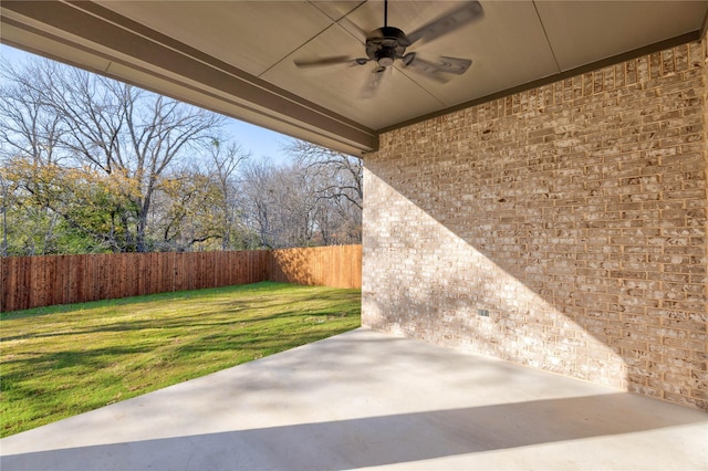 view of patio featuring ceiling fan