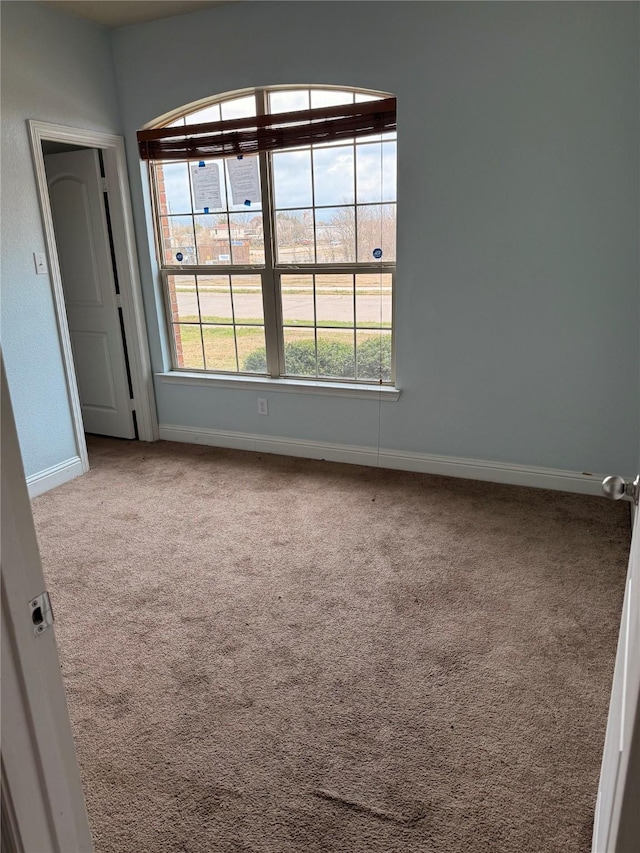 view of carpeted spare room