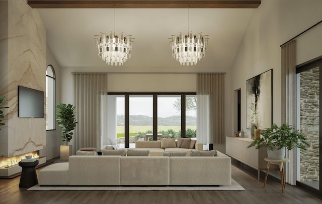 living room with high vaulted ceiling, a mountain view, hardwood / wood-style floors, and an inviting chandelier