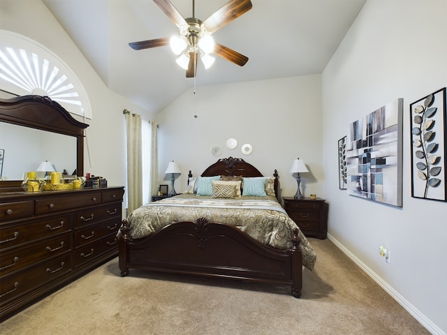 carpeted bedroom featuring ceiling fan and lofted ceiling